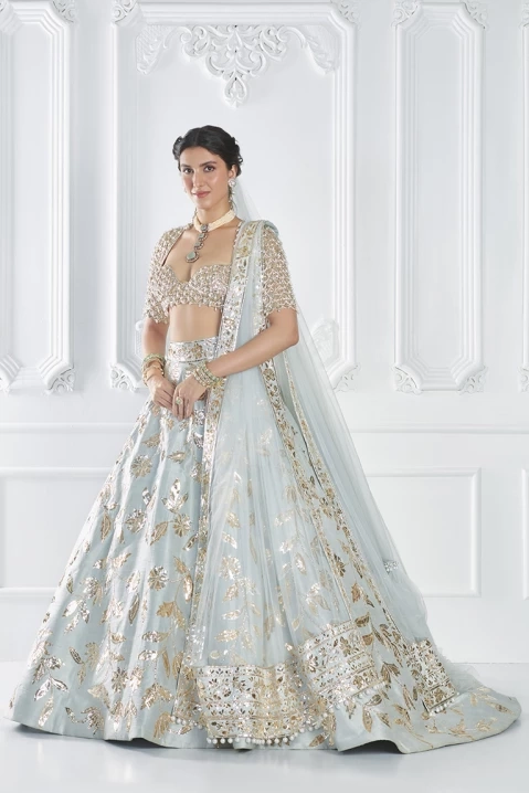 Kirti Kulhari In Gold Silver Metallic Lehenga Set – Roop's Couture