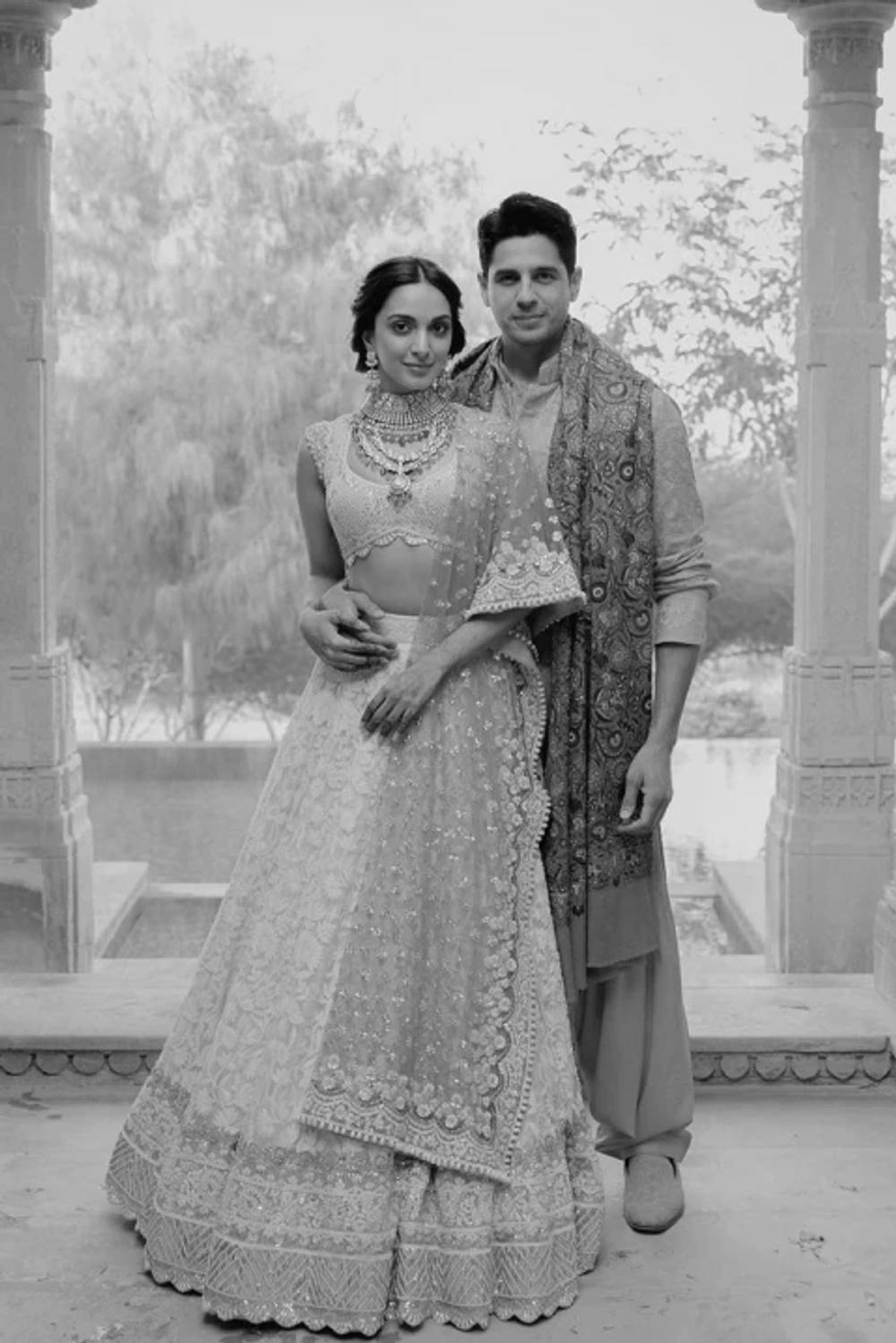 Bride: Kiara & Groom:  Sidharth in our Customized Outfits for Mehendi