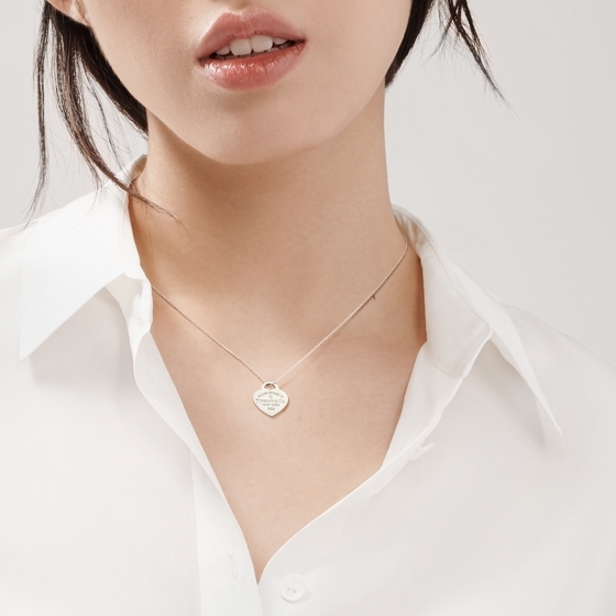 Return to Tiffany® small heart tag in sterling silver on a bead necklace.