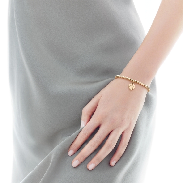Tiffany & Co. Return to 18k Yellow Gold Bead Bracelet & Mini Heart Tag -  Bloomsbury Manor Ltd