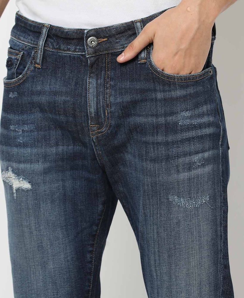 Distressed dark blue deals jeans