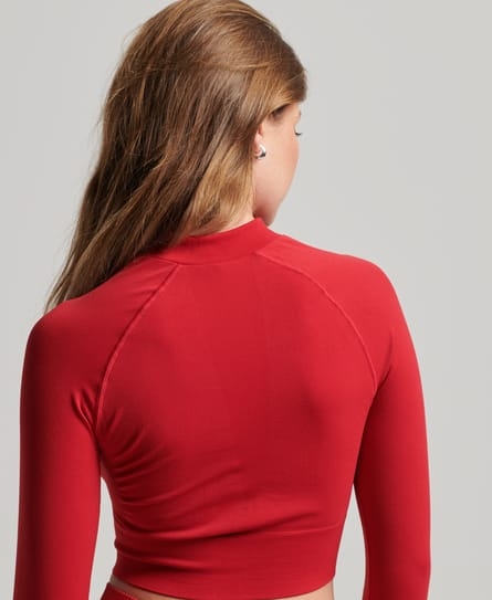 SEAMLESS ZIP THRU MID LAYER WOMEN'S RED TOP