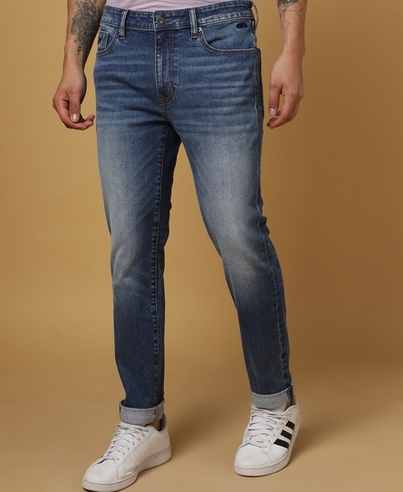 TOKYO SLIM WHISKERED RIPPED BLUE JEANS
